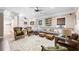 Spacious living room with ample seating, neutral tones, and a cozy atmosphere at 5258 Tallgrass Nw Way, Kennesaw, GA 30152