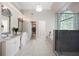 Luxurious primary bathroom with double vanity, glass-enclosed shower, and soaking tub at 5258 Tallgrass Nw Way, Kennesaw, GA 30152