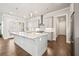 Beautiful kitchen with center island, modern appliances, and plenty of counter space at 993 Harvest Park Ln, Suwanee, GA 30024