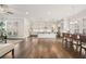 Open-concept kitchen with island, stainless appliances, and hardwood floors, perfect for entertaining at 993 Harvest Park Ln, Suwanee, GA 30024