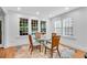 Breakfast nook with large windows and glass table at 1291 Stillwood Ne Dr, Atlanta, GA 30306