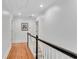 Hallway with hardwood flooring and neutral wall color at 1291 Stillwood Ne Dr, Atlanta, GA 30306