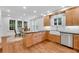 Kitchen boasting hardwood floors, an island, stainless appliances, and a breakfast nook at 1291 Stillwood Ne Dr, Atlanta, GA 30306