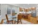 Kitchen boasting an island, breakfast nook, stainless appliances and wood cabinets at 1291 Stillwood Ne Dr, Atlanta, GA 30306