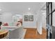 Bright living room with hardwood floors, white walls, and open doorway at 1291 Stillwood Ne Dr, Atlanta, GA 30306