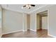 Bedroom featuring neutral walls, modern ceiling fan, and light trim work at 2073 Woodside Park Dr, Woodstock, GA 30188