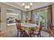 Open floor plan between dining room and other living spaces provides ease of access and comfort at 2073 Woodside Park Dr, Woodstock, GA 30188