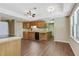 Bright kitchen featuring wood cabinets, modern appliances, and hardwood floors at 2073 Woodside Park Dr, Woodstock, GA 30188