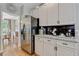 Kitchen detail featuring stainless steel appliances and granite countertops at 2073 Woodside Park Dr, Woodstock, GA 30188