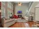 Bright and airy living room with fireplace and hardwood floors at 2073 Woodside Park Dr, Woodstock, GA 30188