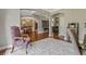 Open-concept living space with hardwood floors and neutral walls, perfect for entertaining at 2073 Woodside Park Dr, Woodstock, GA 30188