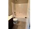 Full bathroom featuring a shower-tub combo and tile flooring at 3897 Valley Bluff Ln, Snellville, GA 30039