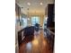 Spacious kitchen featuring stainless steel appliances and dark wood cabinets at 3897 Valley Bluff Ln, Snellville, GA 30039