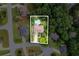 Beautiful aerial view of house featuring a private pool and well-manicured lawns at 635 Piping Rock Pt, Lawrenceville, GA 30043