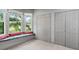 Bedroom featuring a window seat and double closets at 635 Piping Rock Pt, Lawrenceville, GA 30043