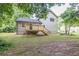 View of the backyard and deck of the house at 1111 Fieldgate Rd, Lawrenceville, GA 30044