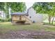 View of the backyard and deck of the house at 1111 Fieldgate Rd, Lawrenceville, GA 30044