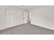 A serene bedroom with plush neutral carpet and a built-in closet at 1111 Fieldgate Rd, Lawrenceville, GA 30044