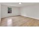 Spacious bedroom featuring neutral walls and hardwood flooring at 1111 Fieldgate Rd, Lawrenceville, GA 30044