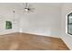 Spacious living room with high ceilings, neutral walls, hardwood floors, and ample natural light at 1111 Fieldgate Rd, Lawrenceville, GA 30044
