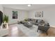 Cozy living room with modern decor, plush seating, and a sleek TV, perfect for relaxation and entertainment at 1111 Fieldgate Rd, Lawrenceville, GA 30044