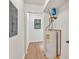 Utility room with water heater and hardwood flooring at 1111 Fieldgate Rd, Lawrenceville, GA 30044