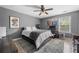 Bedroom features hardwood floors, desk, and movie posters at 143 Monarch Way, Hiram, GA 30141