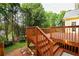 Multi-level back deck overlooking green landscape at 1601 Haven Crest Ct, Powder Springs, GA 30127