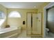 This bathroom features a soaking tub and a walk-in shower at 1601 Haven Crest Ct, Powder Springs, GA 30127