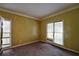 Simple bedroom with carpet floors, neutral paint and natural light from the windows at 1601 Haven Crest Ct, Powder Springs, GA 30127