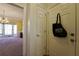 Entryway of home with view into the dining room and natural light from windows at 1601 Haven Crest Ct, Powder Springs, GA 30127