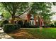 Beautiful red brick home with well-manicured landscaping and a classic, inviting appearance at 1601 Haven Crest Ct, Powder Springs, GA 30127