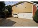 Spacious two-car garage with white doors and a large driveway, offering convenience and extra parking at 1601 Haven Crest Ct, Powder Springs, GA 30127