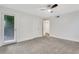 Bedroom with carpet, door with natural light, and a ceiling fan at 206 Tuxworth Cir, Decatur, GA 30033
