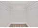 Walk-in closet with wire shelving for efficient storage and carpeted floor at 206 Tuxworth Cir, Decatur, GA 30033