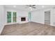 Living room featuring a brick fireplace and wood floors at 206 Tuxworth Cir, Decatur, GA 30033