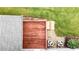 Well maintained backyard featuring patio, lawn, landscaping, and air conditioning units at 224 Mountain View Dr, Woodstock, GA 30188