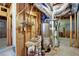 Unfinished basement featuring water heater and exposed pipes at 224 Mountain View Dr, Woodstock, GA 30188