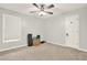 Bedroom with neutral walls, carpet, ceiling fan, window, and closet at 224 Mountain View Dr, Woodstock, GA 30188
