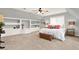Bedroom featuring a bed, ceiling fan, built-in cabinets, and natural light at 224 Mountain View Dr, Woodstock, GA 30188