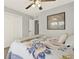 Bedroom with a bed, a ceiling fan, and a closet at 224 Mountain View Dr, Woodstock, GA 30188