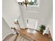 Elegant entryway features a chandelier, hardwood floors, stairs, and a large front door at 224 Mountain View Dr, Woodstock, GA 30188