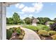 A beautifully landscaped yard leads to this charming home, showcasing its inviting curb appeal at 224 Mountain View Dr, Woodstock, GA 30188