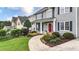 A well-manicured lawn and lush landscaping complement this charming two-story home at 224 Mountain View Dr, Woodstock, GA 30188