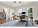 A home office provides a versatile space with natural light and convenient access to the rest of the home at 224 Mountain View Dr, Woodstock, GA 30188