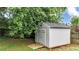 Backyard storage shed with ramp for easy access at 224 Mountain View Dr, Woodstock, GA 30188
