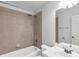 Bathroom with tub, shower, toilet, and sink with vanity, and a neutral color palette at 5865 Trailwood Ct, Suwanee, GA 30024