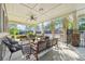 This patio offers generous seating with a ceiling fan to keep you cool on summer evenings at 5865 Trailwood Ct, Suwanee, GA 30024