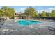 Enjoy this community pool featuring plenty of seating and a clubhouse nearby at 5865 Trailwood Ct, Suwanee, GA 30024