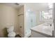 Elegant bathroom with a white subway tile shower and vanity with quartz countertop at 1890 Carla Dr, Morrow, GA 30260